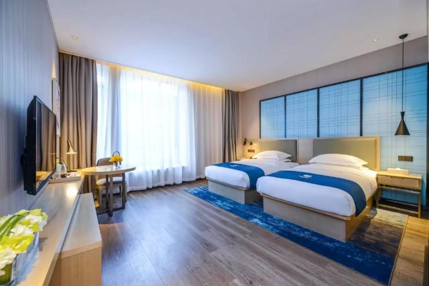 Echarm Hotel Ji'Nan Railway Station Jinan Dış mekan fotoğraf